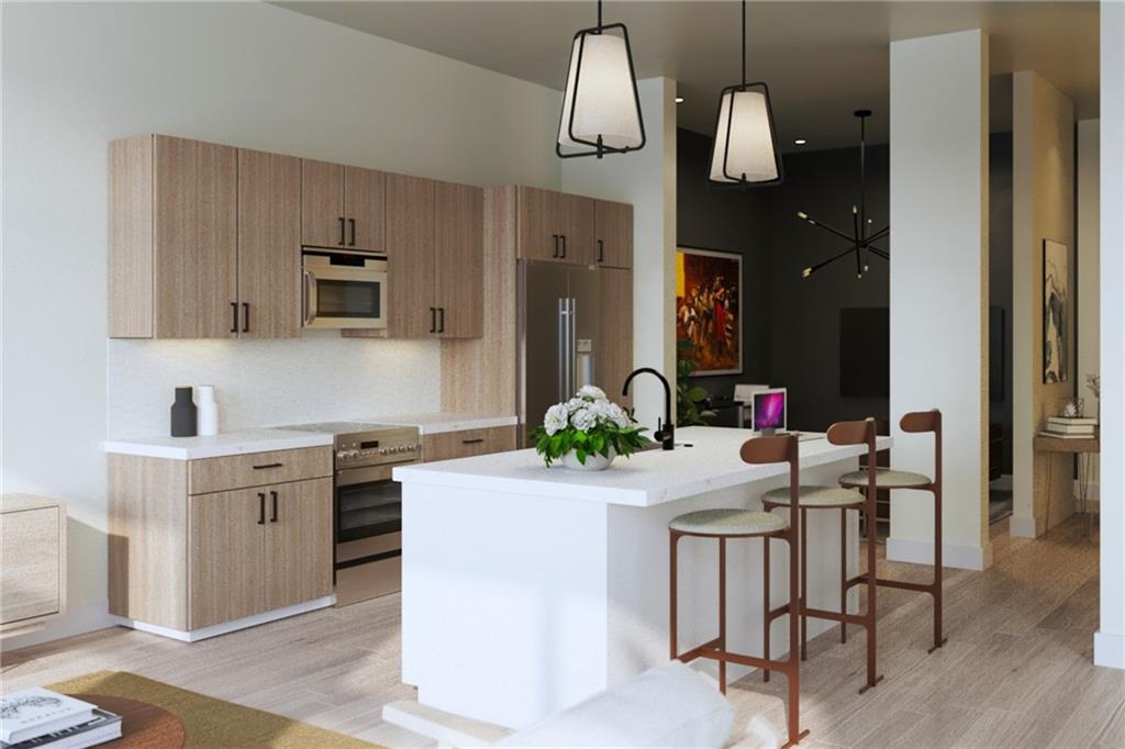 567 Ponce De Leon Avenue Northeast, Unit 516 Atlanta, GA 30308 - Photo 1 of 45 a kitchen with a sink cabinets and window