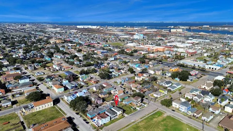 a view of a city with ocean view