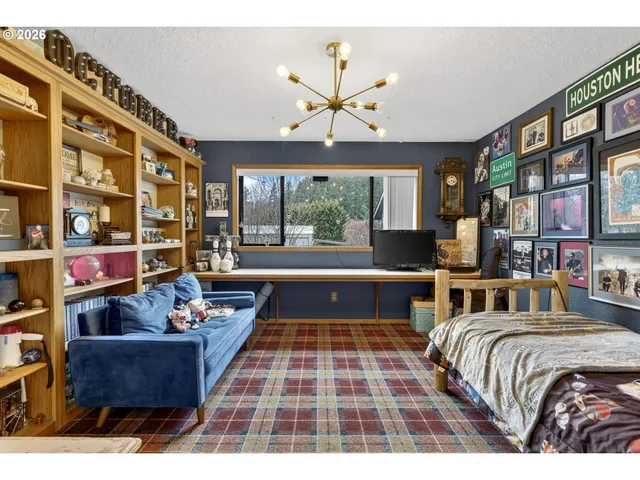 a living room with lots of furniture and decor