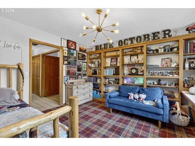 a bathroom with a toilet a sink and a mirror