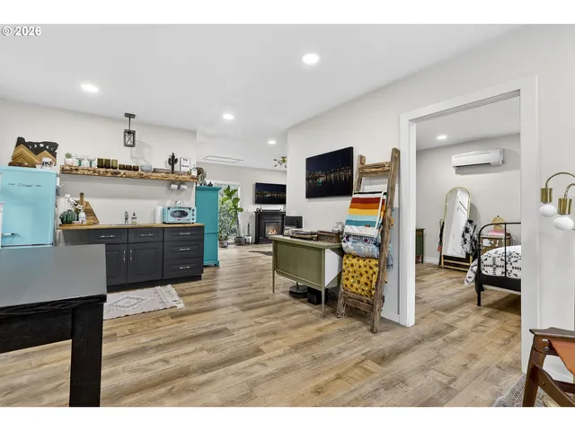a kitchen with a sink a stove and cabinets