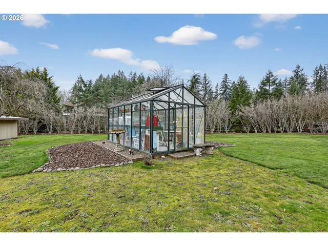 a house view with a garden space