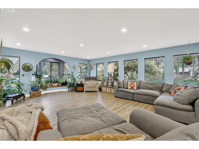 a living room with furniture and window