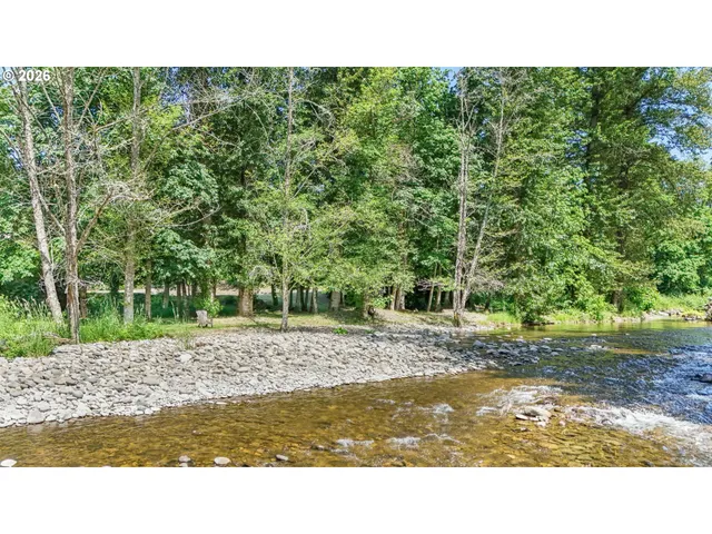 a view of swimming pool with a yard and seating