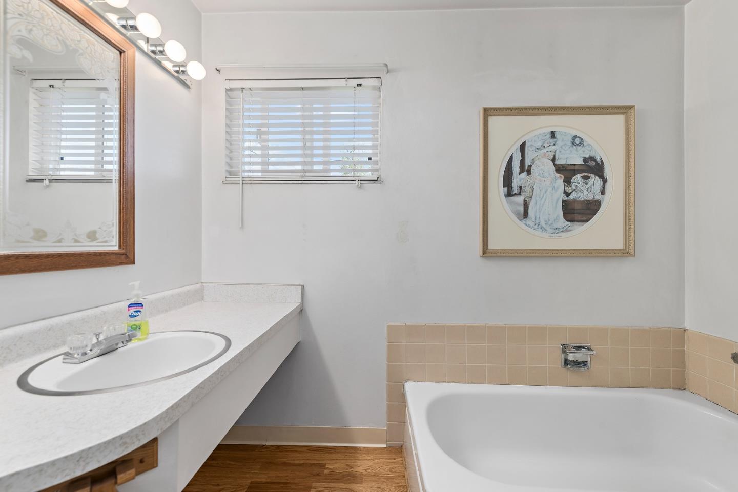 1471 Inskip Drive Campbell, CA 95008 - Photo 11 of 21 a bathroom with a bathtub and a sink