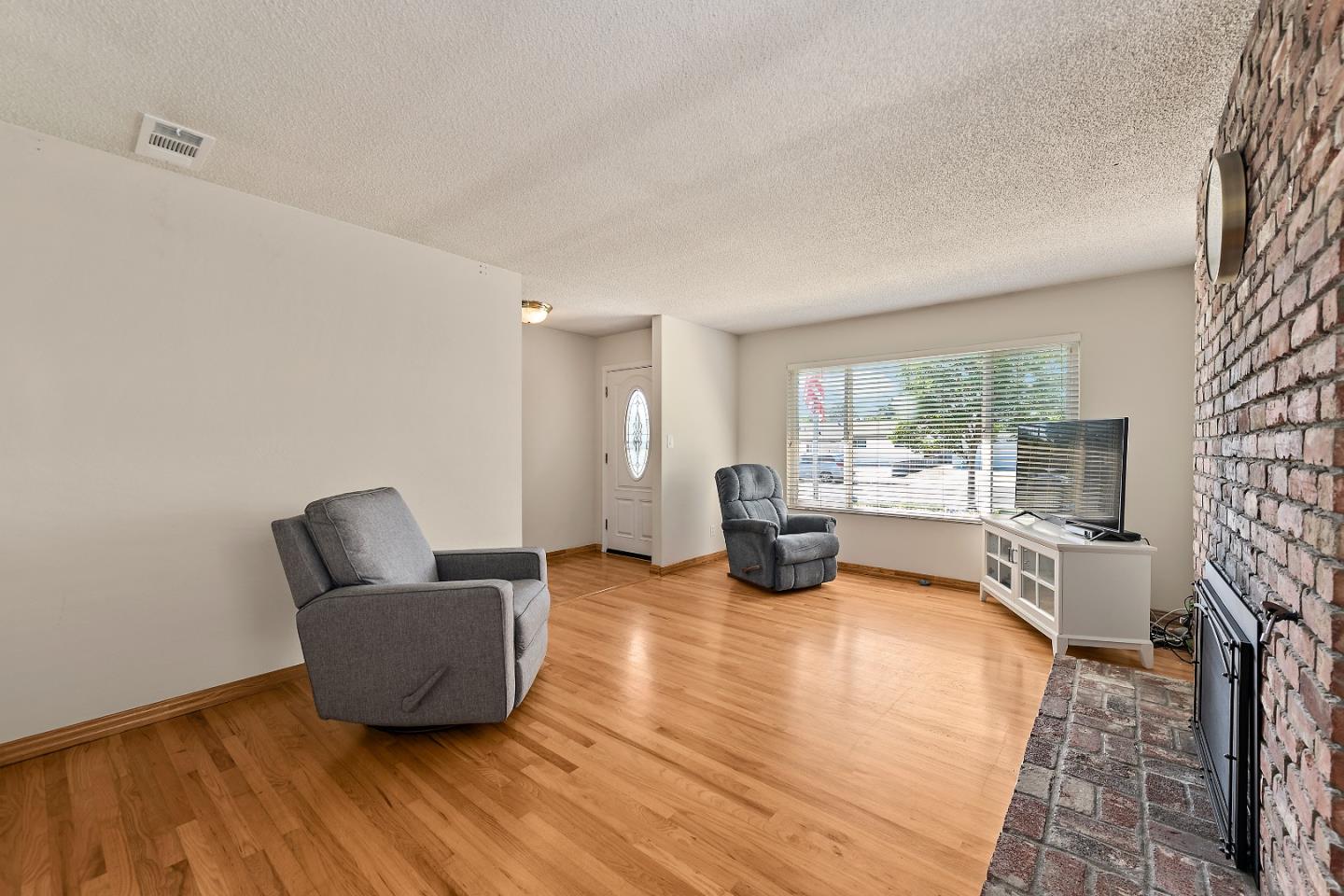 1471 Inskip Drive Campbell, CA 95008 - Photo 5 of 21 a living room with furniture and a wooden floor