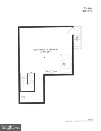 a view of staircase with railing and a chandelier