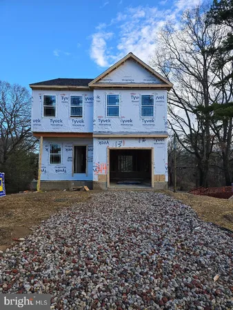 a sign that is on next to a road