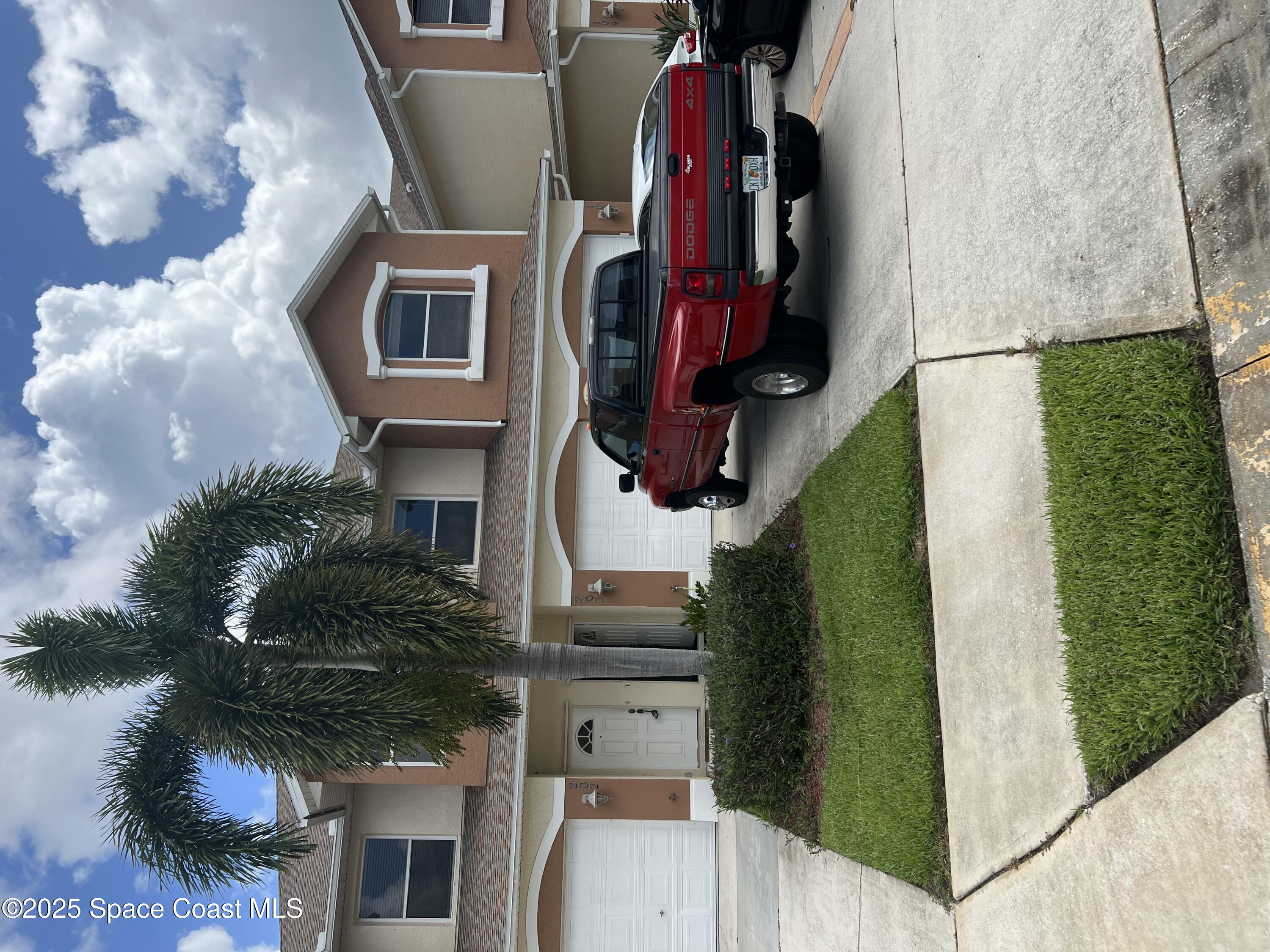a house view with a garden space