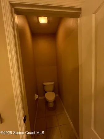 a view of a bathroom with a shower and a sink