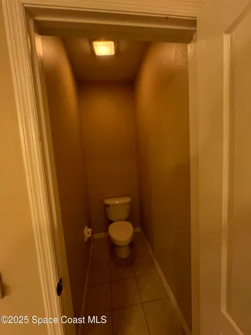 a view of a bathroom with a shower and a sink