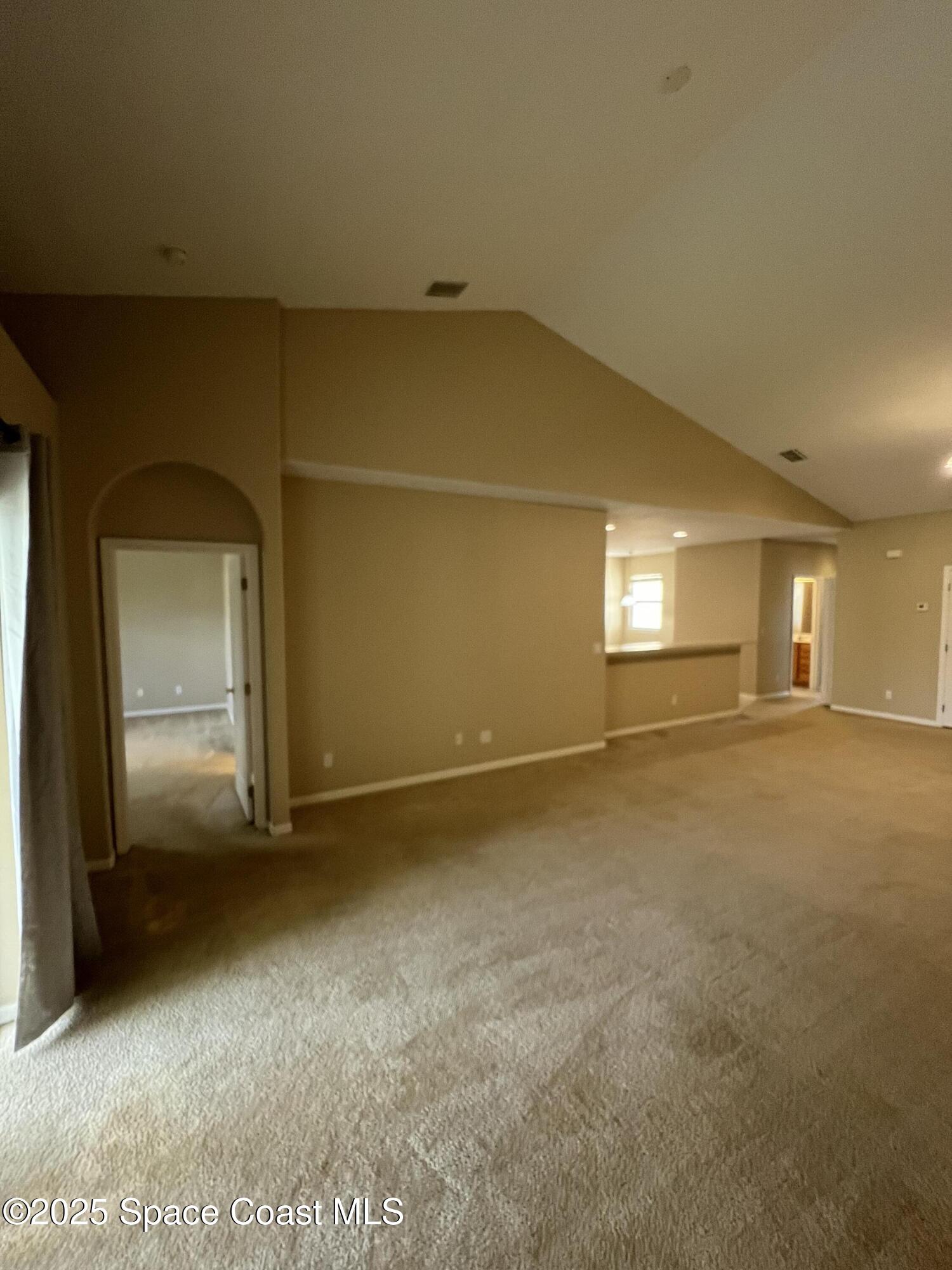 1040 Venetian Drive, Unit 203 Melbourne, FL 32904 - Photo 5 of 23 a view of an empty room