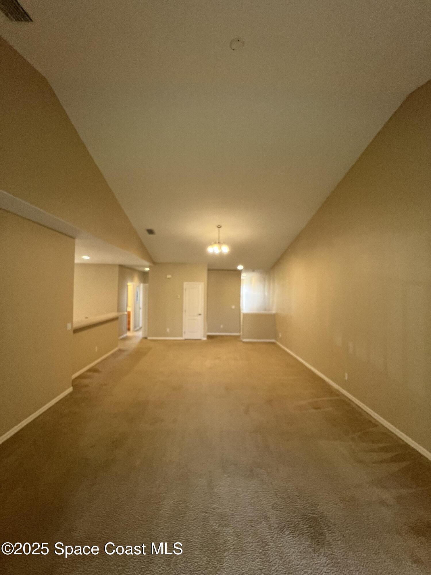1040 Venetian Drive, Unit 203 Melbourne, FL 32904 - Photo 6 of 23 a view of empty room
