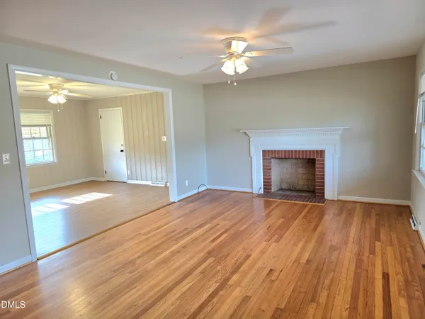 a view of kitchen with wooden floor