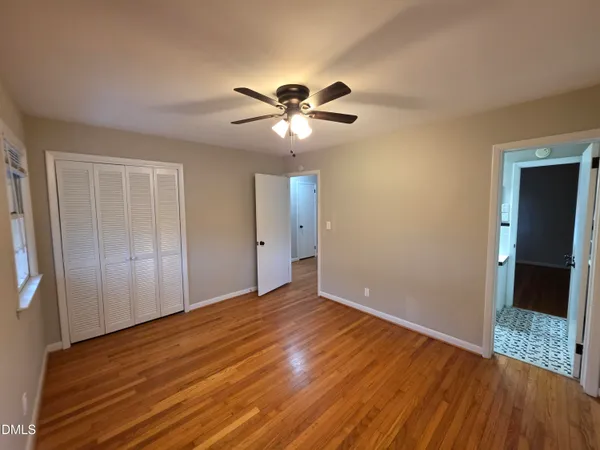 a front view of a house with a yard outdoor seating and garage