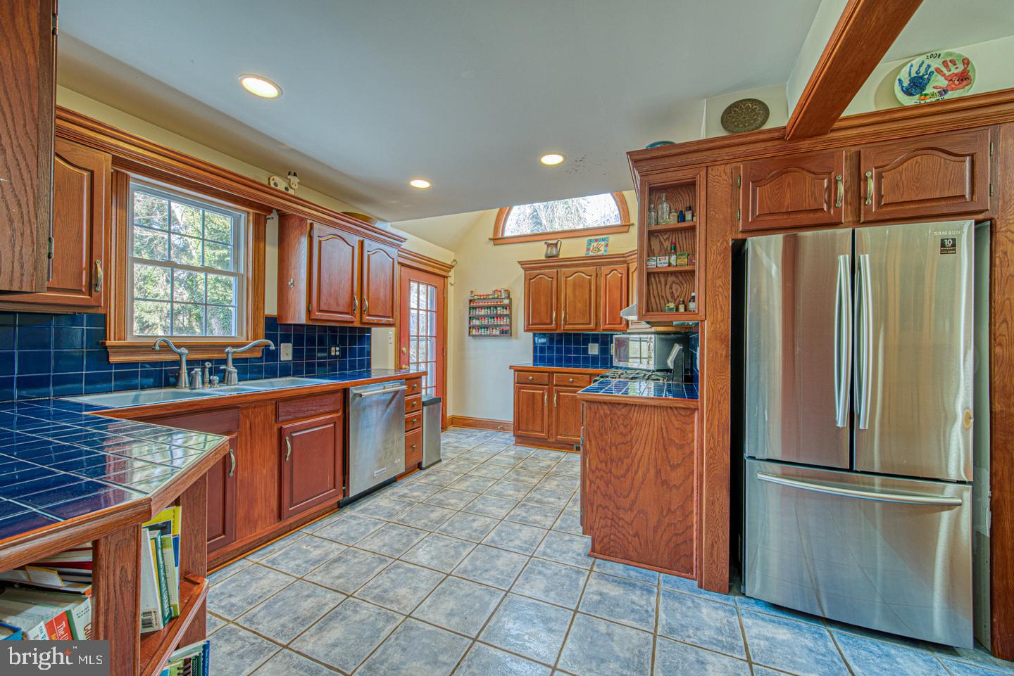 470 Farnum Road Media, PA 19063 - Photo 13 of 66 a kitchen with stainless steel appliances granite countertop a refrigerator a stove and a sink