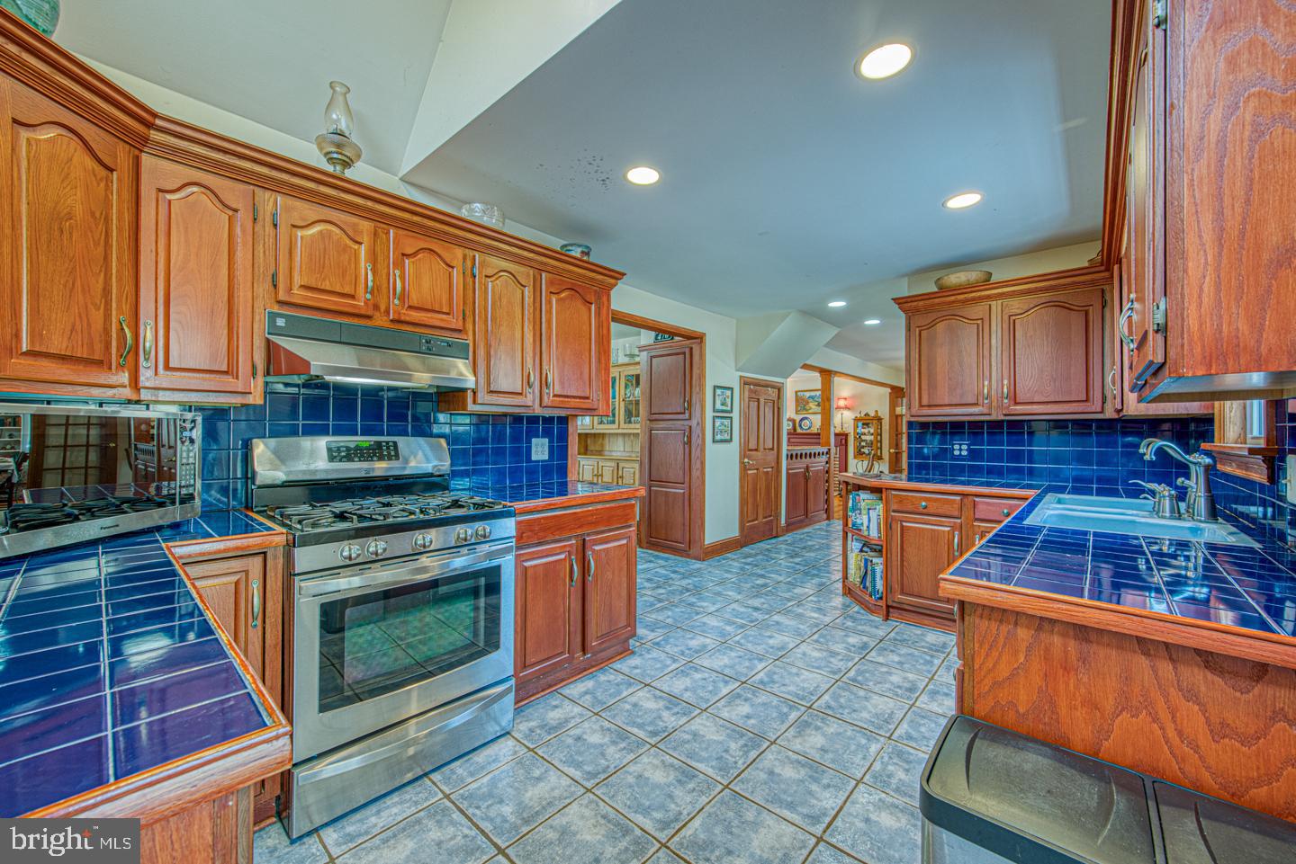 470 Farnum Road Media, PA 19063 - Photo 16 of 66 a kitchen with stainless steel appliances granite countertop a stove a sink and a refrigerator