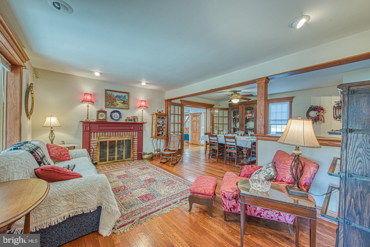 470 Farnum Road Media, PA 19063 - Photo 3 of 66 a living room with furniture a rug and a fireplace