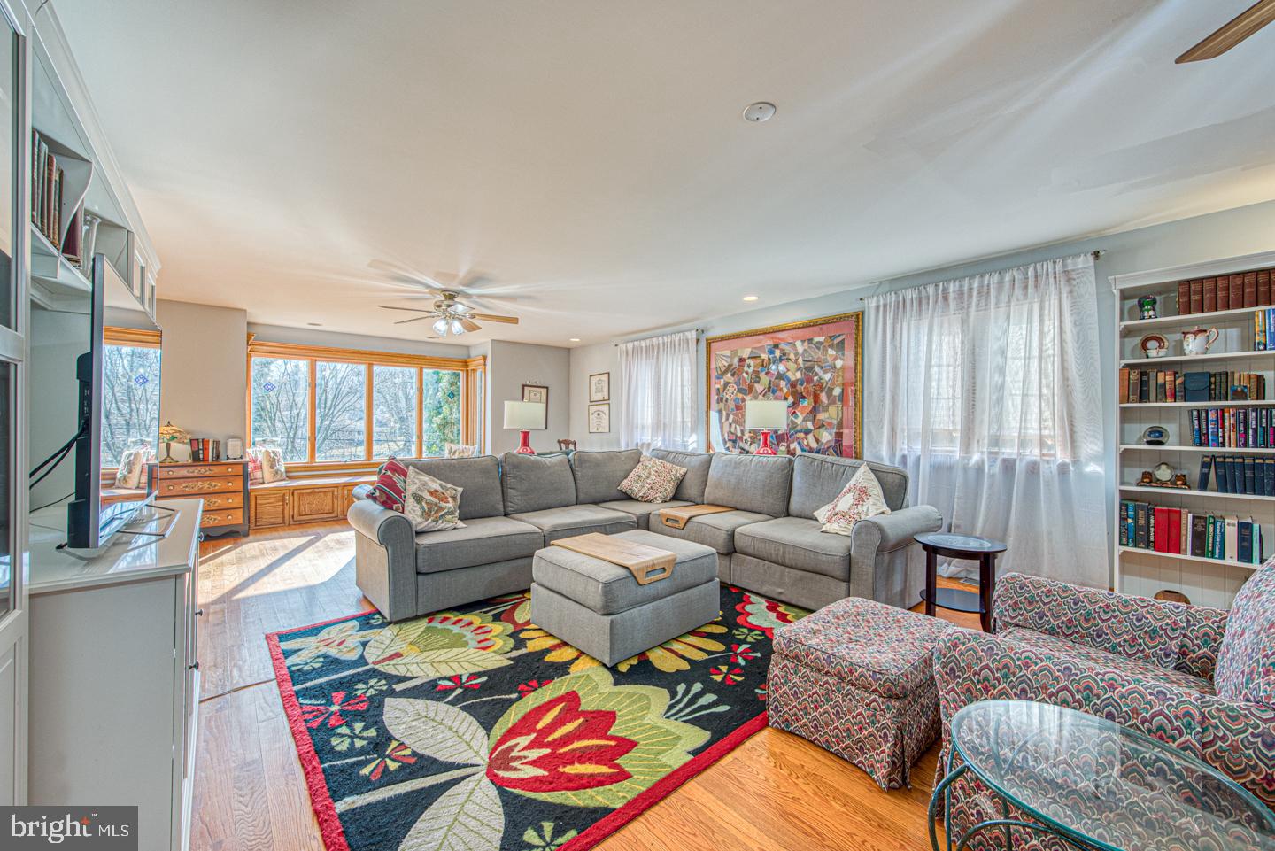 470 Farnum Road Media, PA 19063 - Photo 35 of 66 a living room with furniture and a book shelf