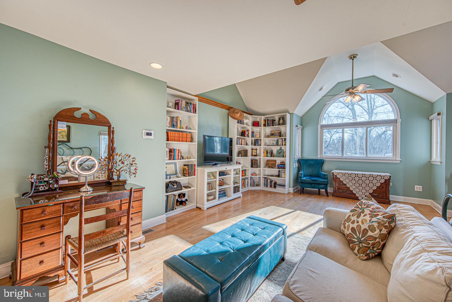 470 Farnum Road Media, PA 19063 - Photo 44 of 66 a living room with furniture a rug and a book shelf