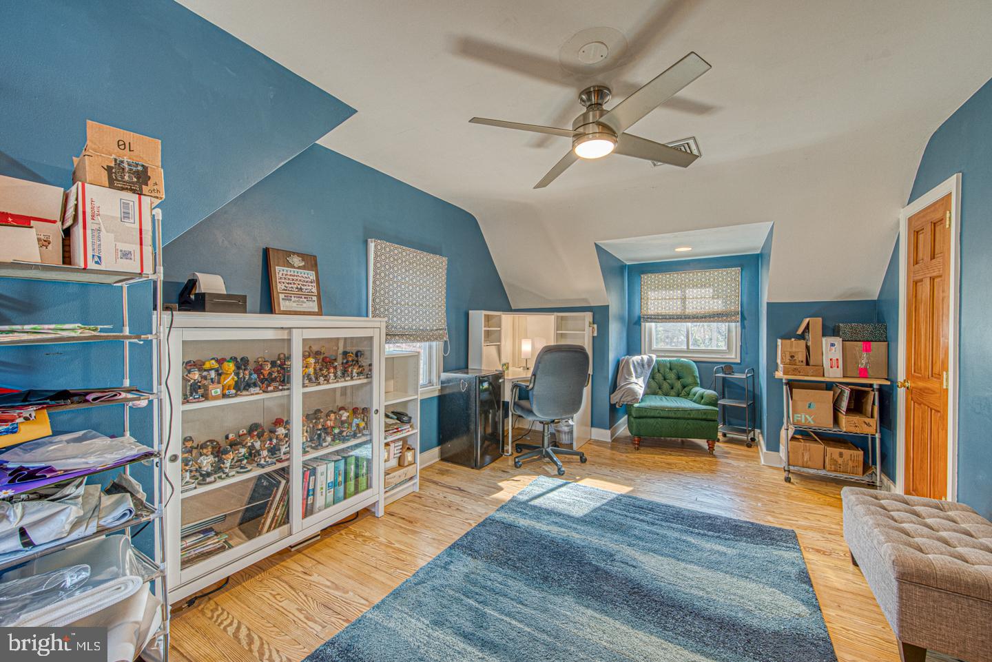 470 Farnum Road Media, PA 19063 - Photo 56 of 66 a living room with lots of furniture and a book shelf