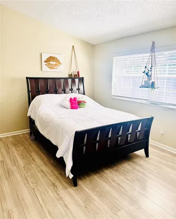 a kitchen with a sink cabinets and appliances