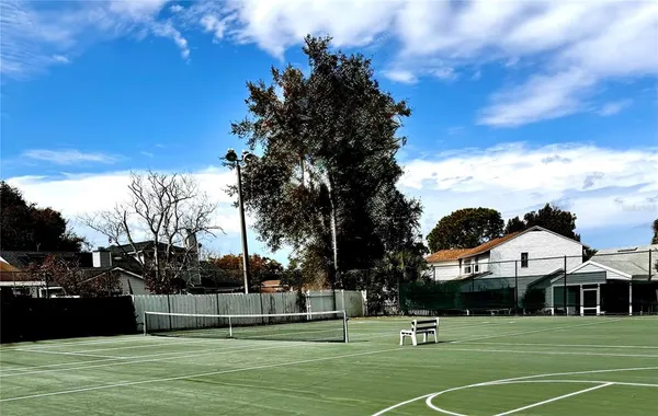 a view of a lake with a yard