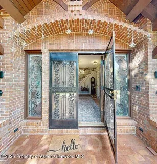 a view of a entryway door front of house