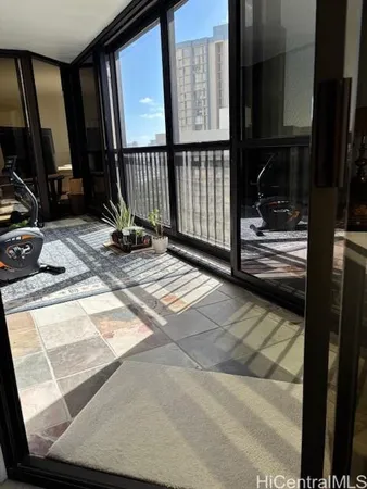 a view of a balcony with chair
