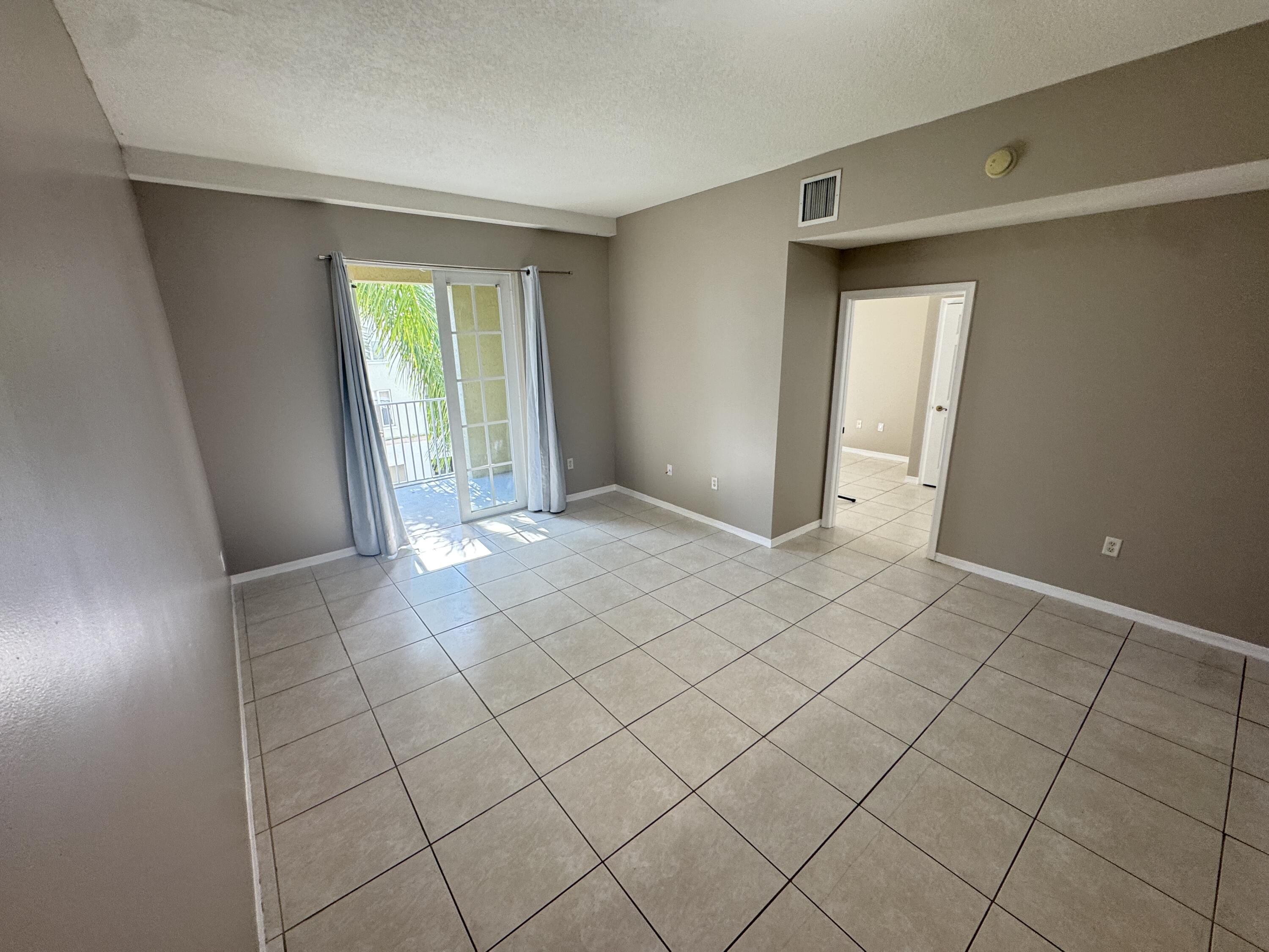 1203 Town Center Drive, Unit 306 Jupiter, FL 33458 - Photo 14 of 21 a view of entryway with window
