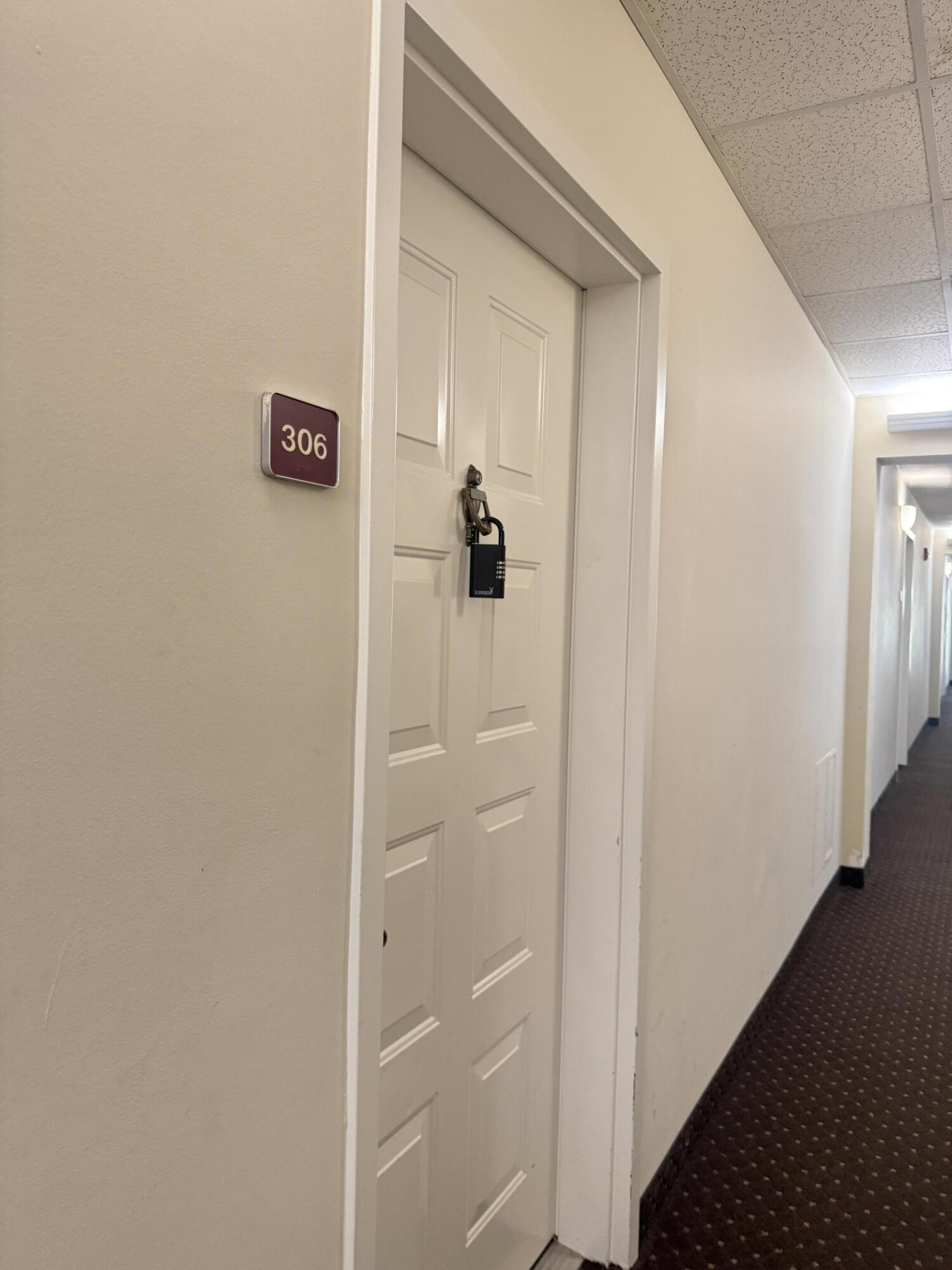 1203 Town Center Drive, Unit 306 Jupiter, FL 33458 - Photo 18 of 21 a bathroom with a shower