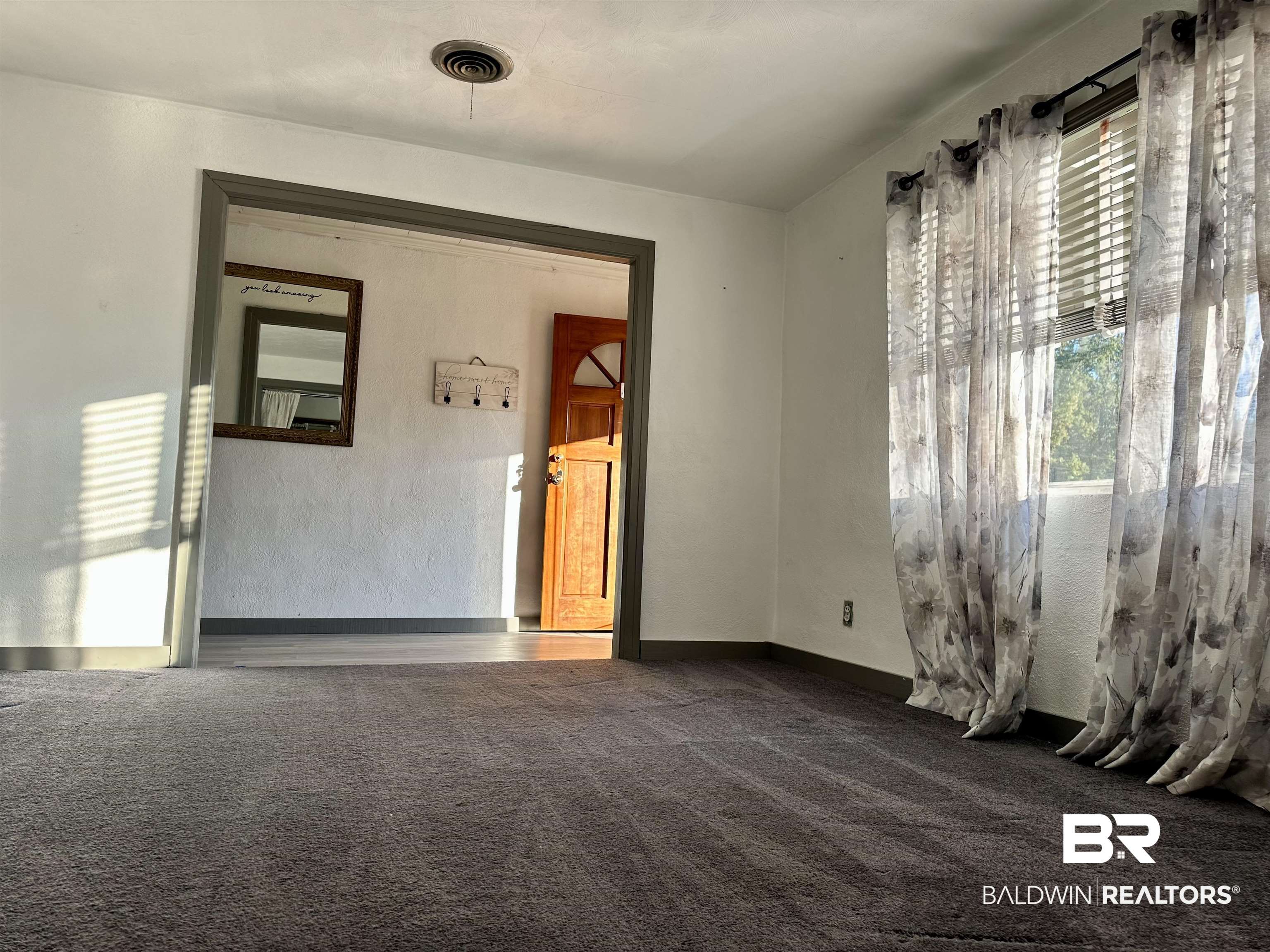 1206 St Nicholas Avenue Brewton, AL 36426 - Photo 6 of 19 View of carpeted spare room