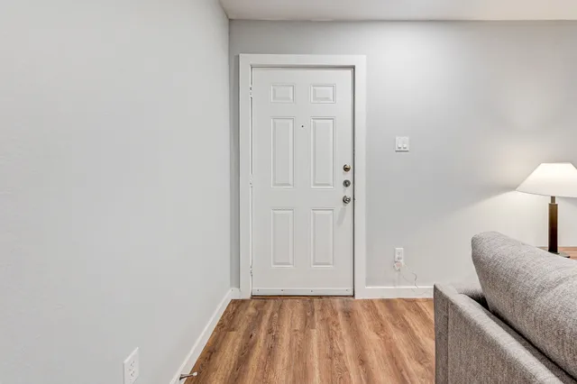 a view of an empty room and window
