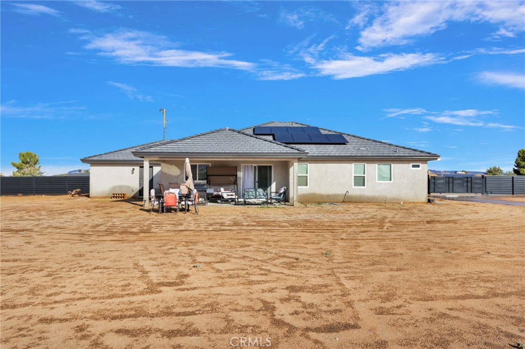 21533 Del Oro Road Apple Valley, CA 92308 - Photo 26 of 35 a front view of a house with patio