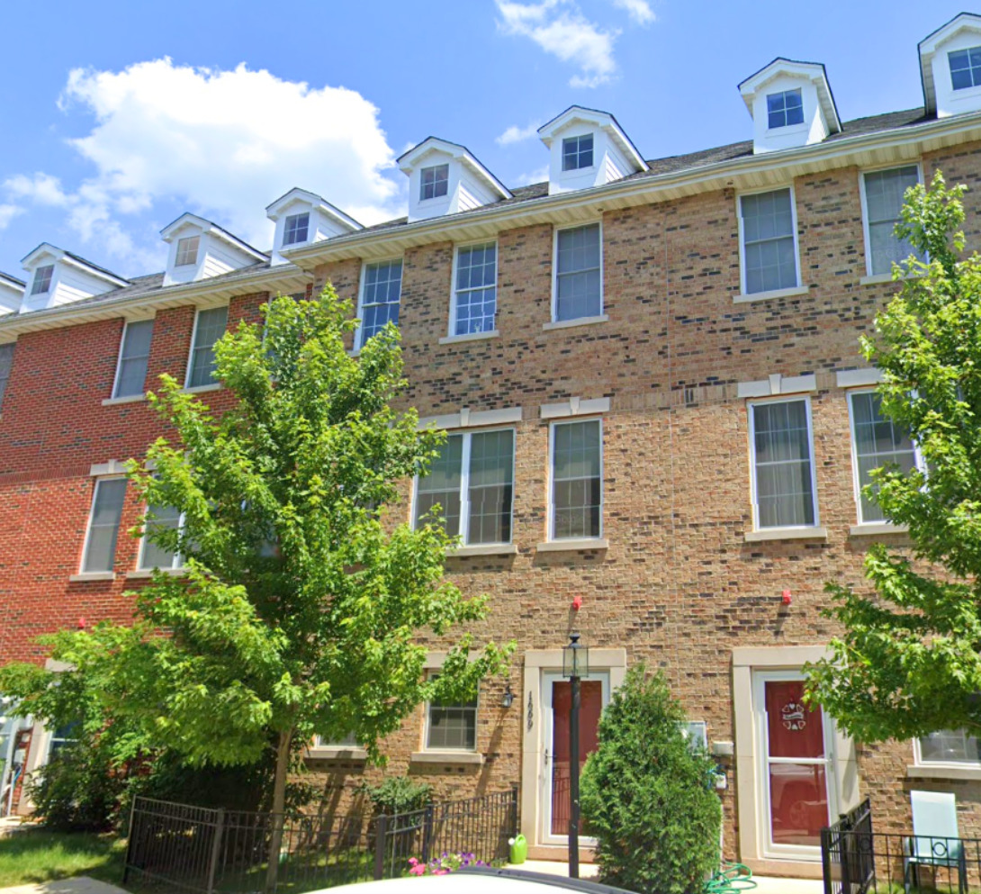 1669 Church Street Evanston, IL 60201 - Photo 1 of 31 front view of a brick house with a large windows