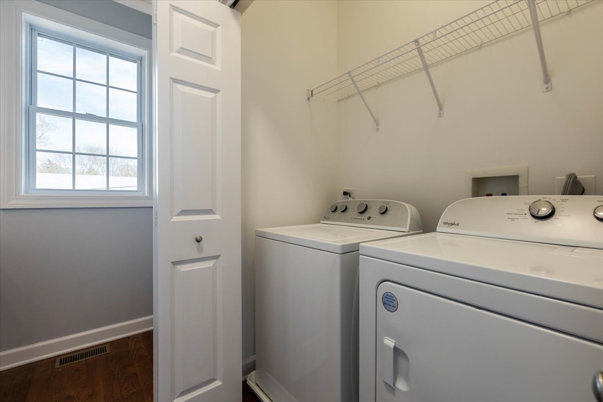 1669 Church Street Evanston, IL 60201 - Photo 12 of 31 a utility room with dryer and washer