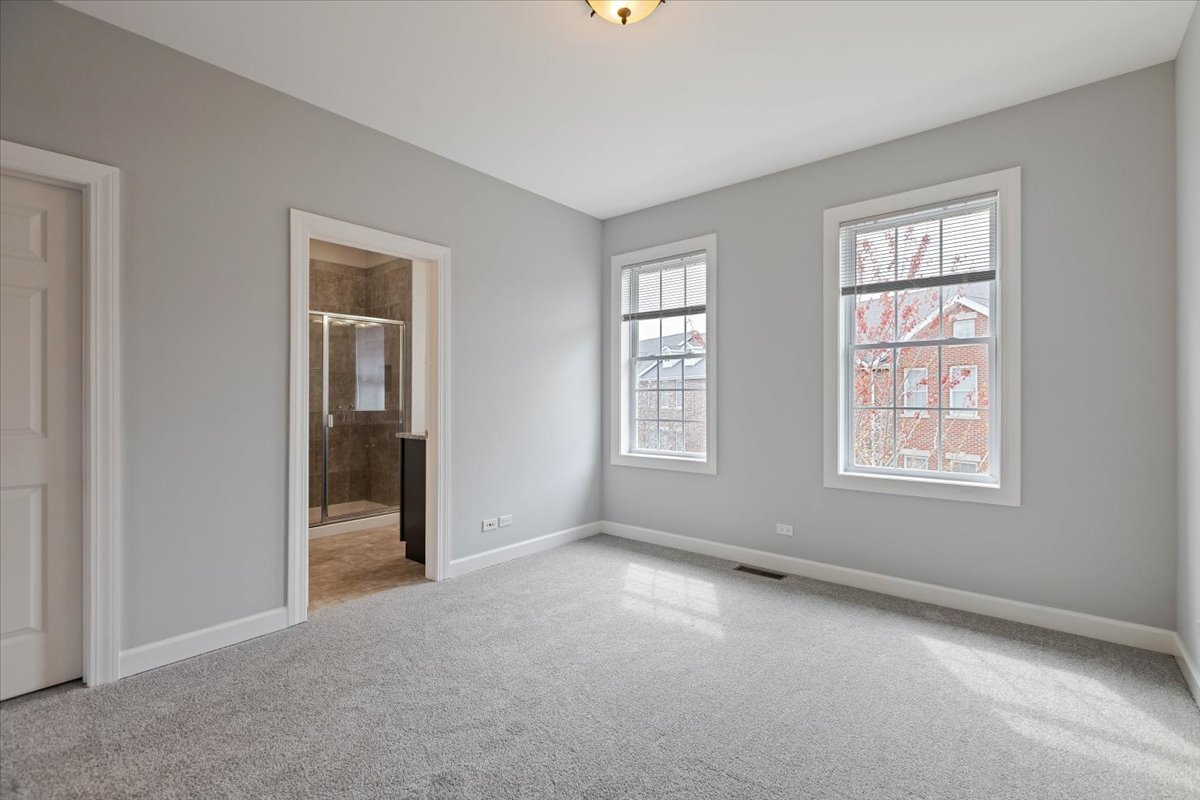 1669 Church Street Evanston, IL 60201 - Photo 14 of 31 a view of an empty room with a window