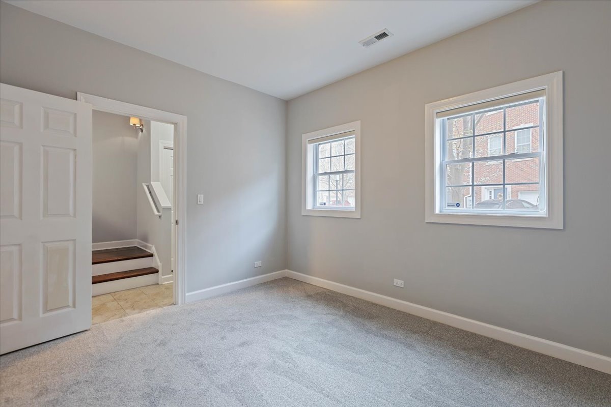 1669 Church Street Evanston, IL 60201 - Photo 26 of 31 an empty room with windows