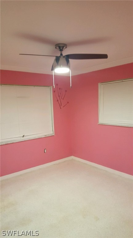 1003 East Penn Road Lehigh Acres, FL 33936 - Photo 4 of 12 a view of a room with a fan