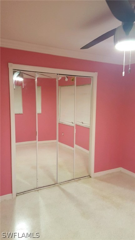 1003 East Penn Road Lehigh Acres, FL 33936 - Photo 5 of 12 an empty room with fan