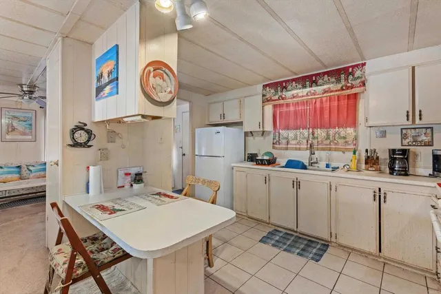 a view of a kitchen area of the house