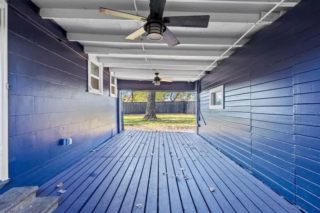a view of wooden floor in an empty room