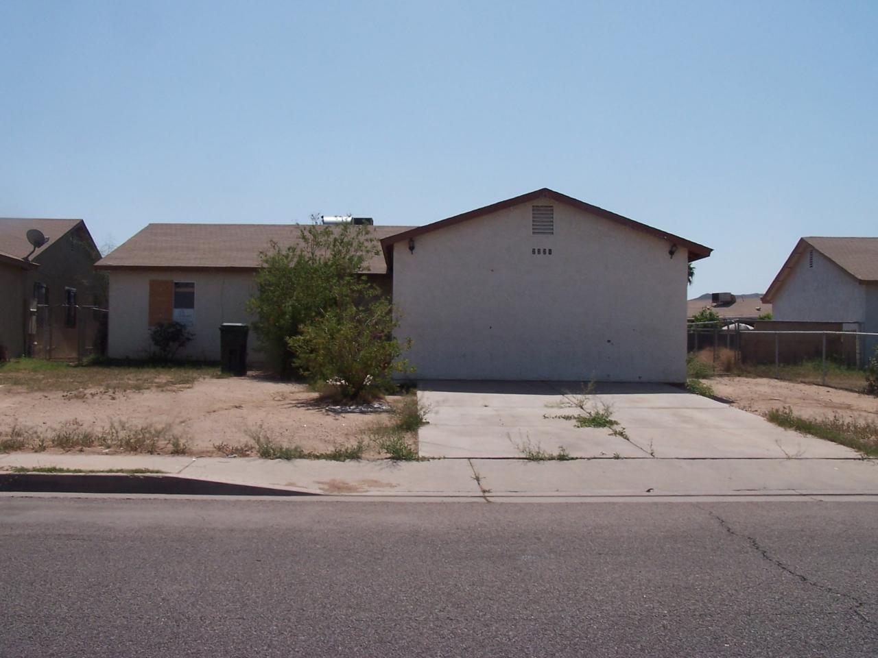 Front of Home Right Across from Park