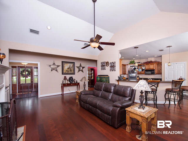 9380 Greenleaf Drive Daphne, AL 36527 - Photo 11 of 24 Spacious Great Room with fireplace connects to Kitchen and Breakfast Bar for great entertaining!