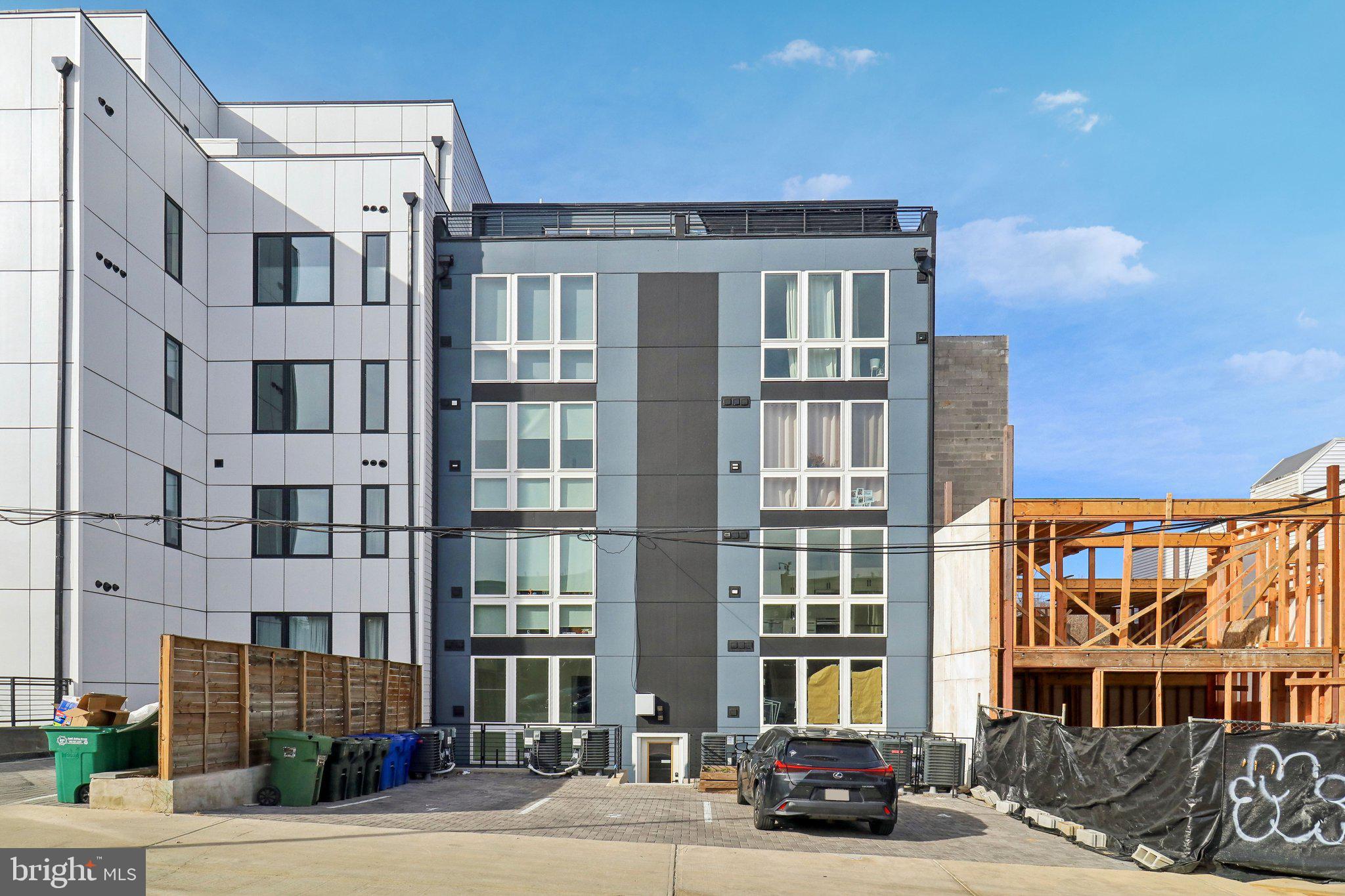 2213 M Street Northeast, Unit 4 Washington, DC 20002 - Photo 2 of 39 a front view of a building with a street