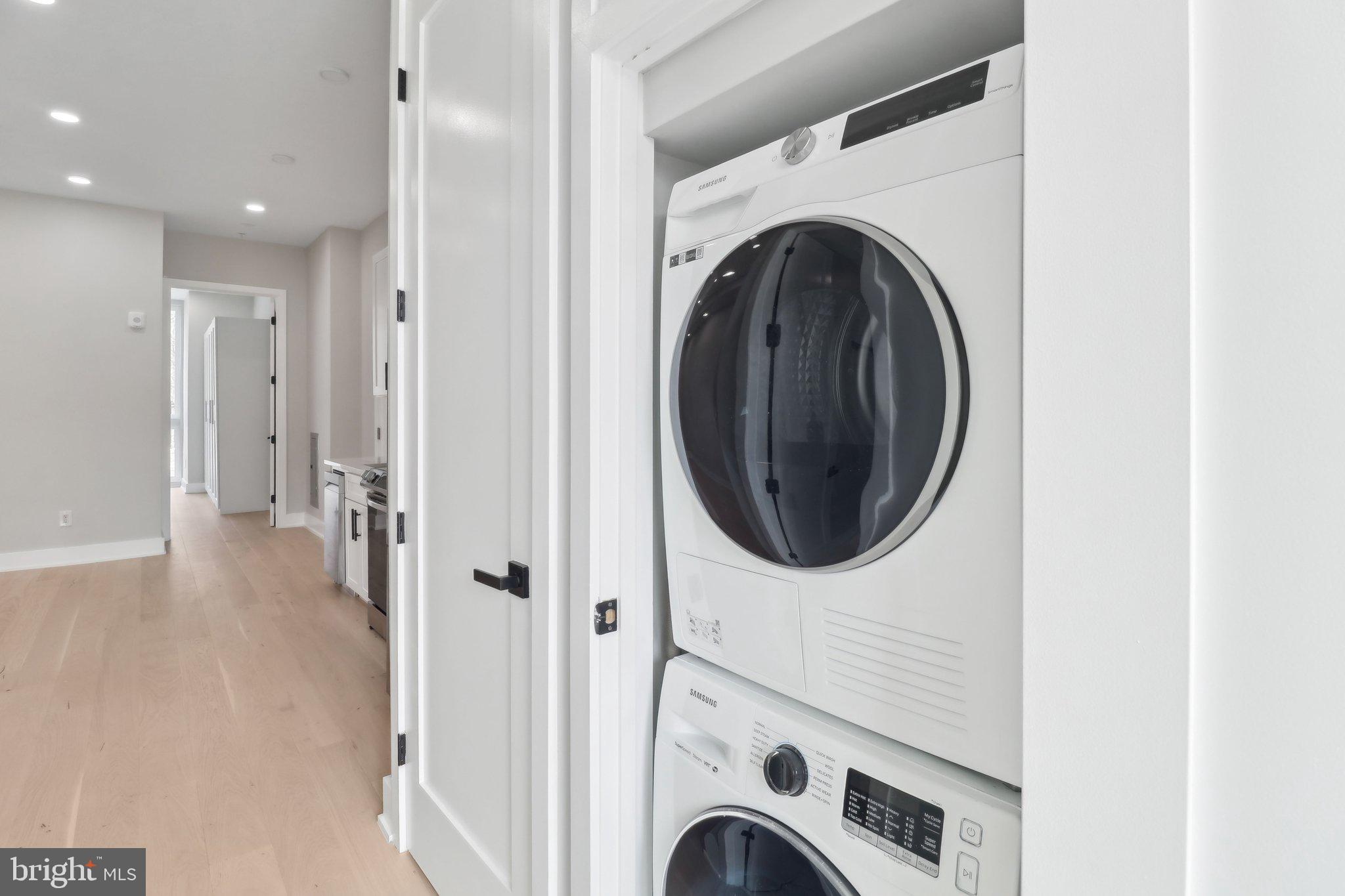 2213 M Street Northeast, Unit 4 Washington, DC 20002 - Photo 25 of 39 a view of a hallway with washer and dryer