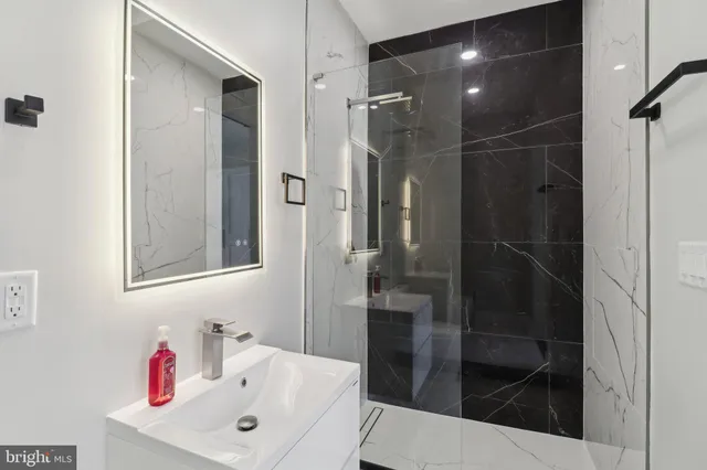 a view of front door and bedroom