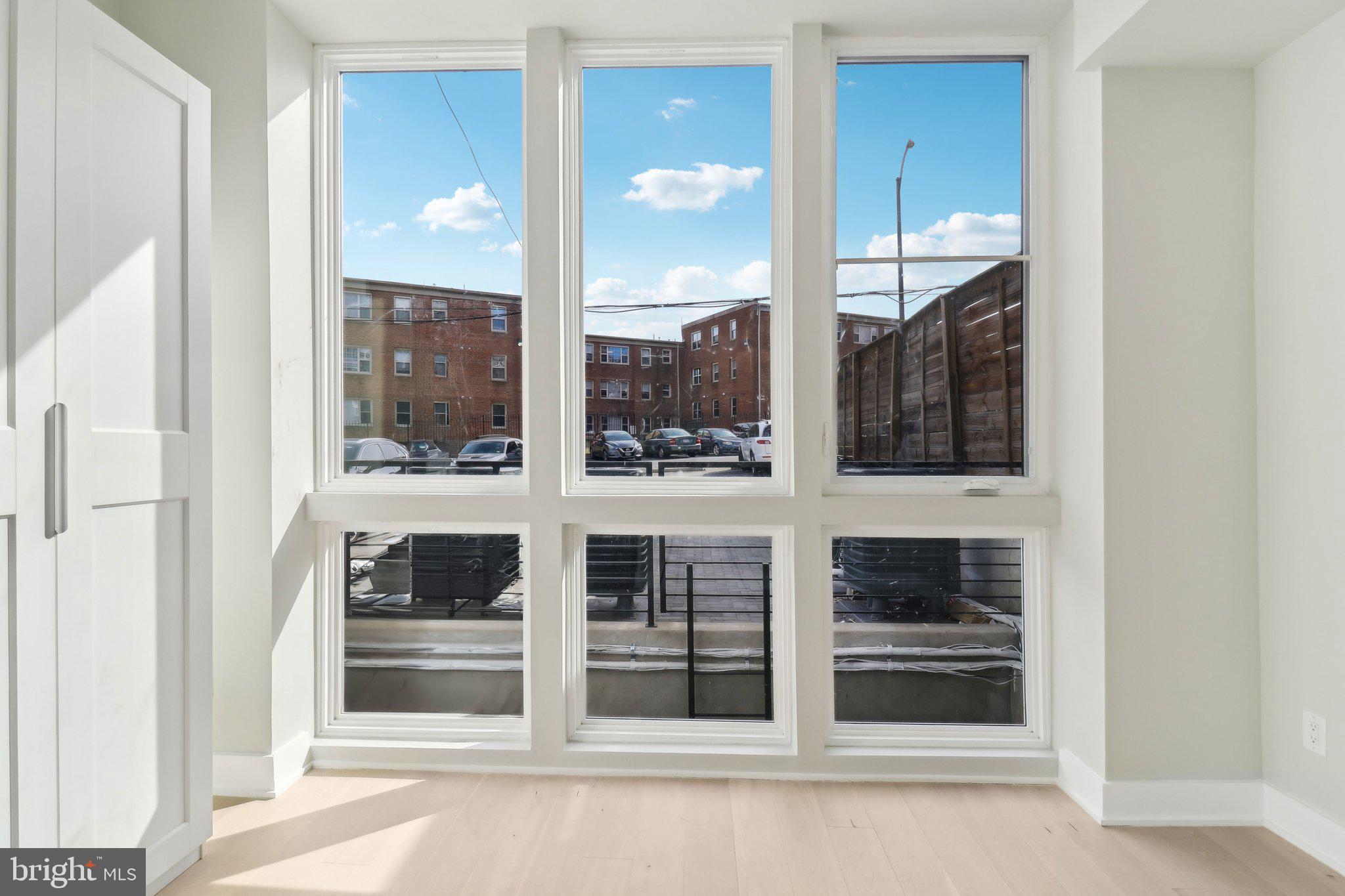 2213 M Street Northeast, Unit 4 Washington, DC 20002 - Photo 33 of 39 a view of front door and bedroom