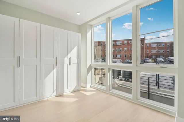 a view of wooden door and entryway