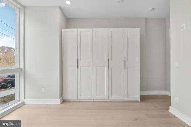 a front view of a building with a street